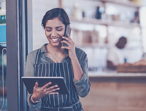 Woman-on-phone-tablet_Retail